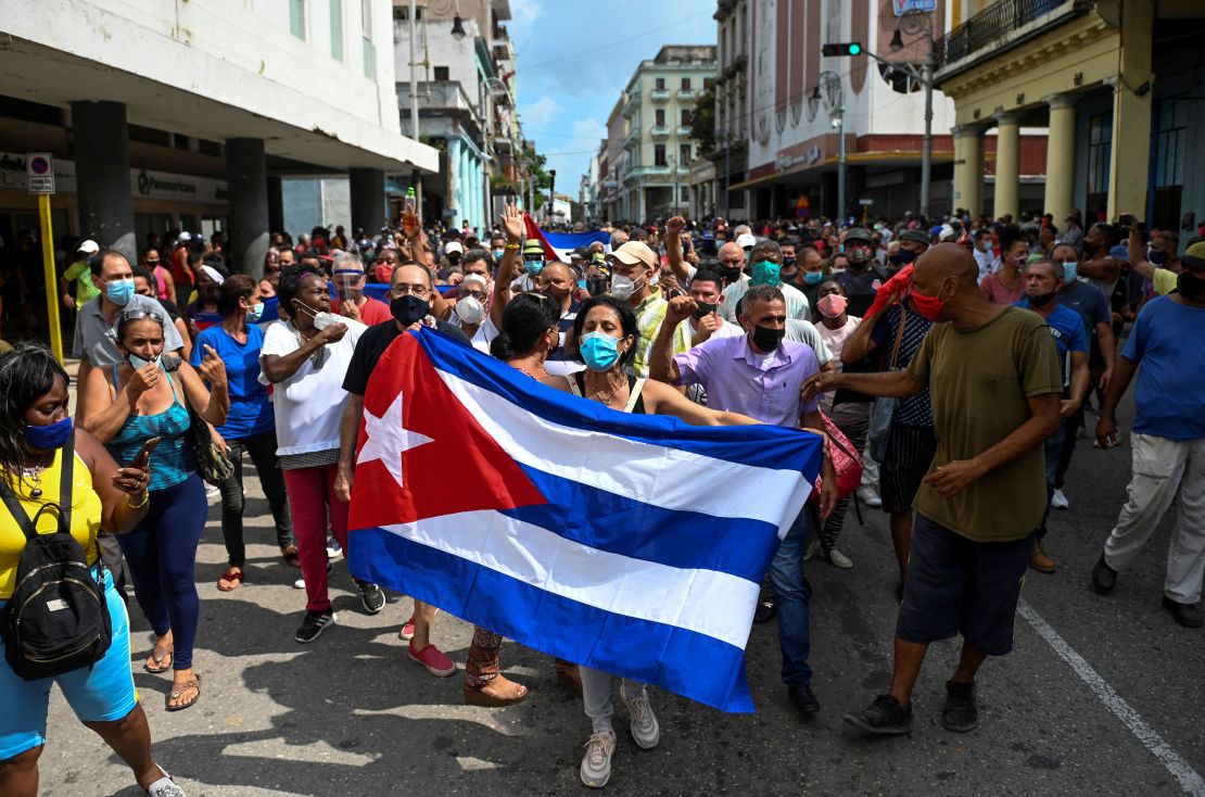People take part in a demonstration to support the government of Cuban President Miguel Diaz-Canel in Havana, on July 11.