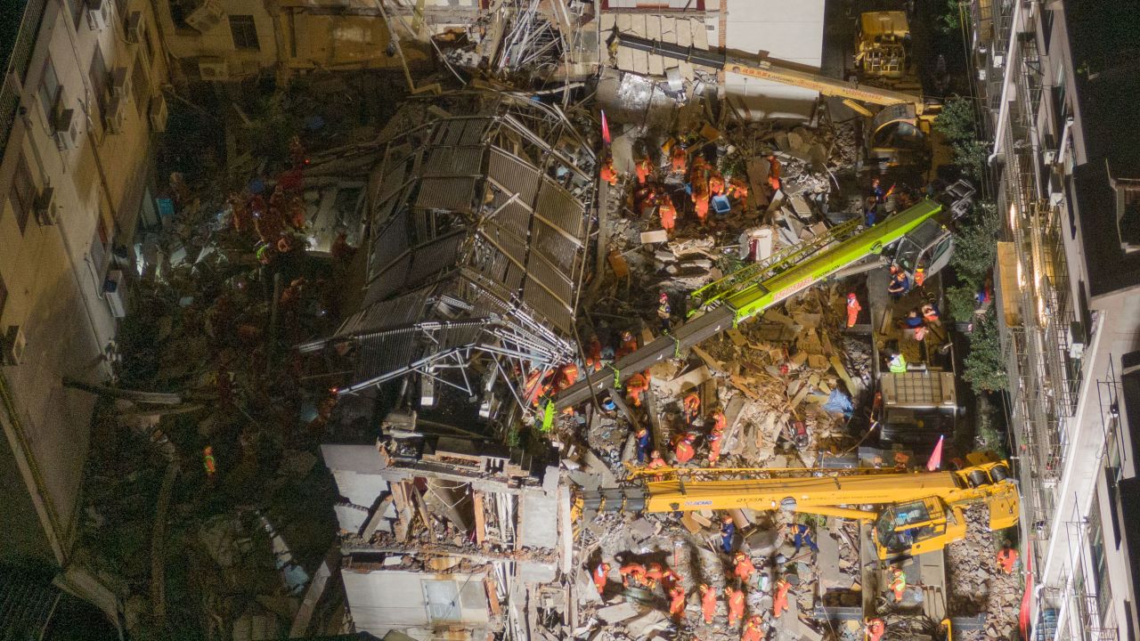 Aerial view of rescuers searching for trapped people in the debris of a collapsed hotel on July 13 in Suzhou, Jiangsu Province, China.