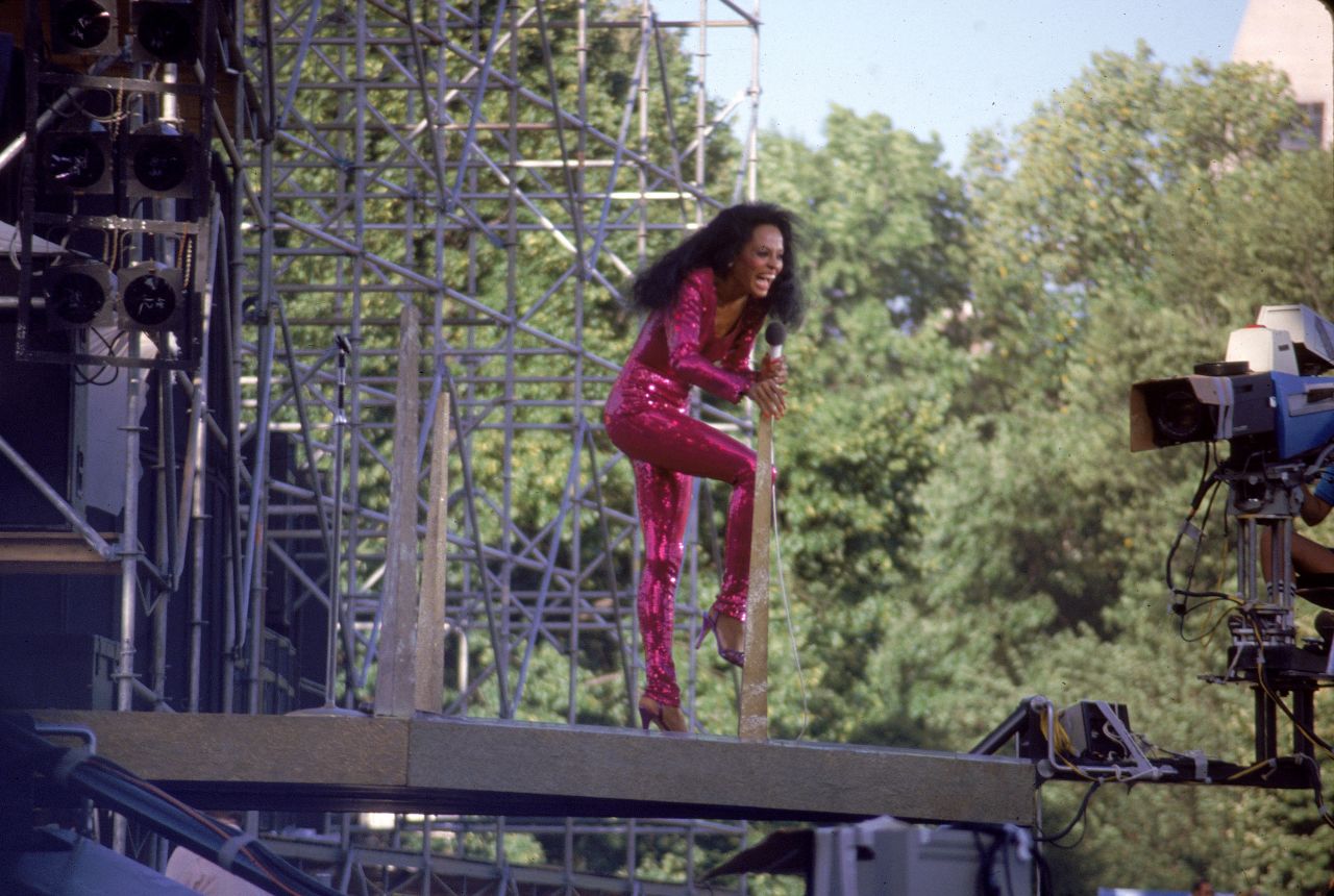 Diana Ross donned a violet sequined jumpsuit as she returned to Central Park the next day.