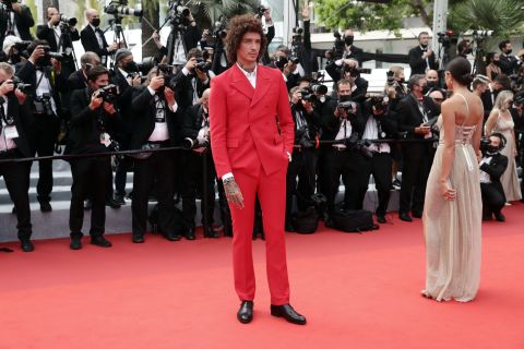 Musician Julian Perretta went for a bold red suit.