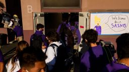 Students return to in-person learning at St. Anthony Catholic High School during the Covid-19 pandemic on March 24, 2021 in Long Beach, California. - The school of 445 students implemented a hybrid learning model, with approximately 60 percent of students returning to in an in-person classroom learning environment with Covid-19 safety measures including face masks, social distancing, plexiglass barriers around desks, outdoor spaces, and schedule changes. (Photo by Patrick T. FALLON / AFP) (Photo by PATRICK T. FALLON/AFP via Getty Images)