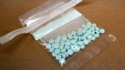 Tablets believed to be laced with fentanyl are displayed at the Drug Enforcement Administration Northeast Regional Laboratory on October 8, 2019 in New York. (Photo by DON EMMERT/AFP via Getty Images)