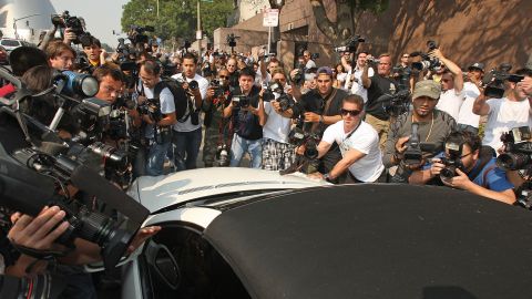 Photographers mob Britney Spears' car in October 2007 as she arrives at family court for a hearing to work out custody arrangements with her ex-husband Kevin Federline.