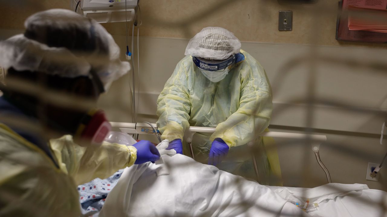 Medical staff assist a Covid-19 patient at Mount Sinai South Nassau in Oceanside, New York, on April 14, 2020.