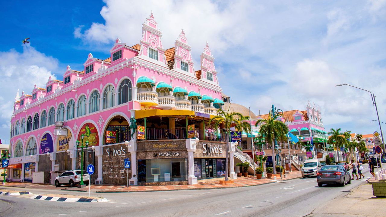 Aruba is known for its white-sand beaches and colorful buildings in the capital city of Oranjestad.