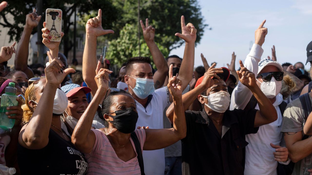 Anti-government protesters march in Havana on Sunday.