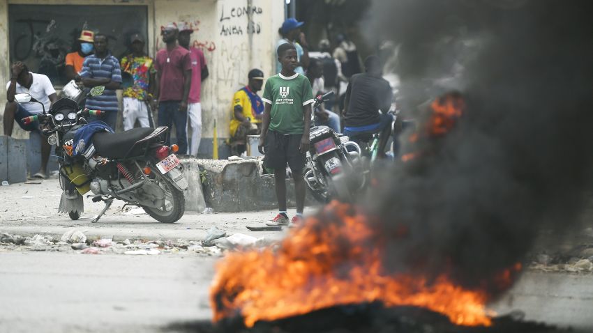 cnnheroes haiti AP photo tire fire