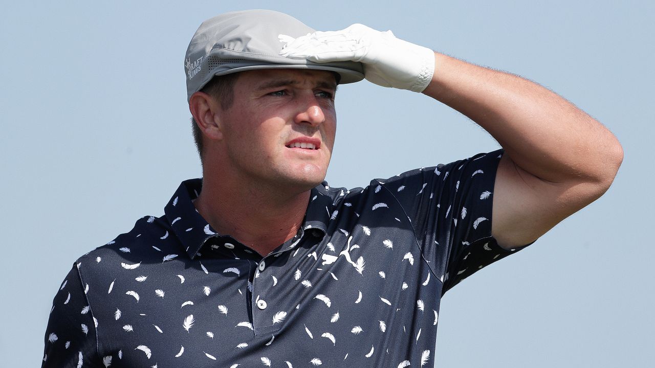 DeChambeau lines up a shot during day one of The Open.