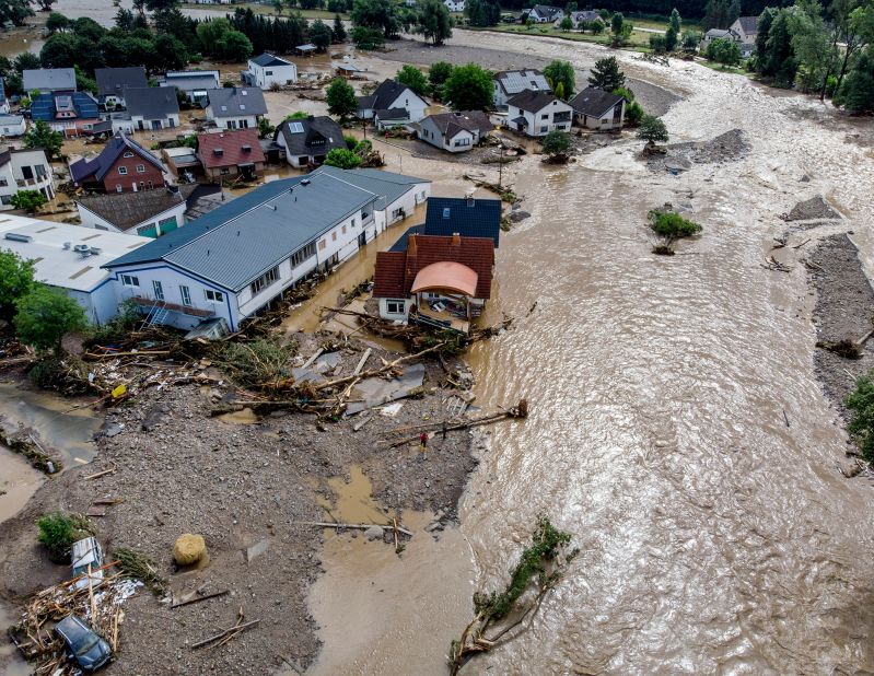 Houses are damaged by flooding in Insul, Germany, on Thursday.