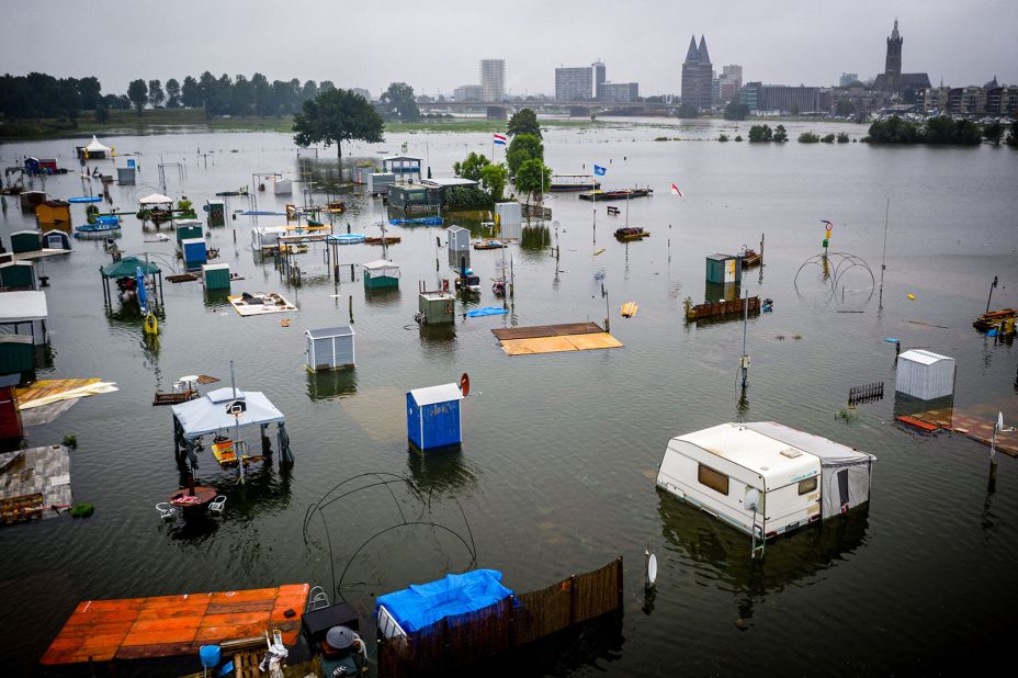 Caravans and campers are partially submerged in Roermond, Netherlands.