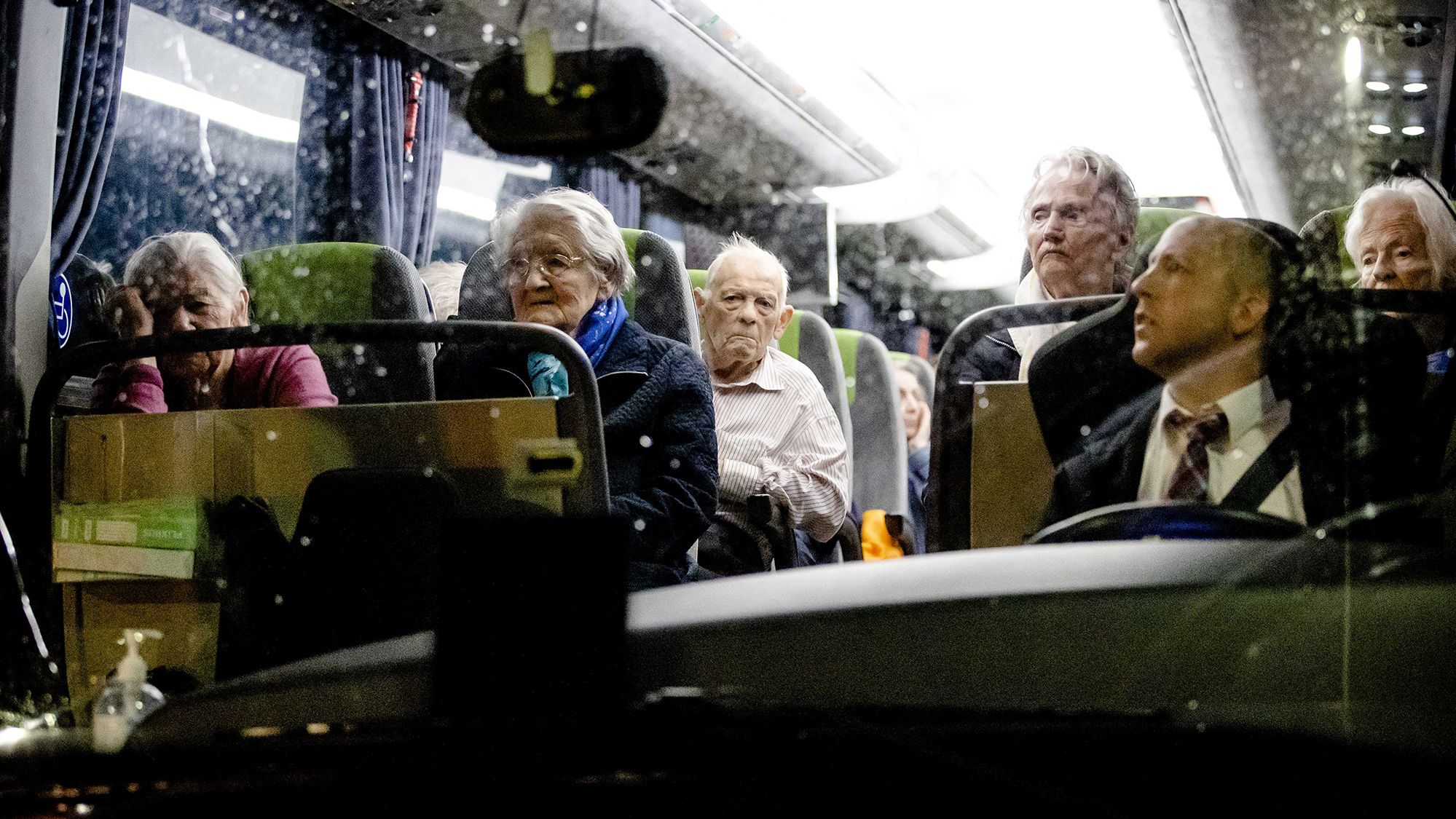 Evacuees ride a bus in Valkenburg aan de Geul, Netherlands.