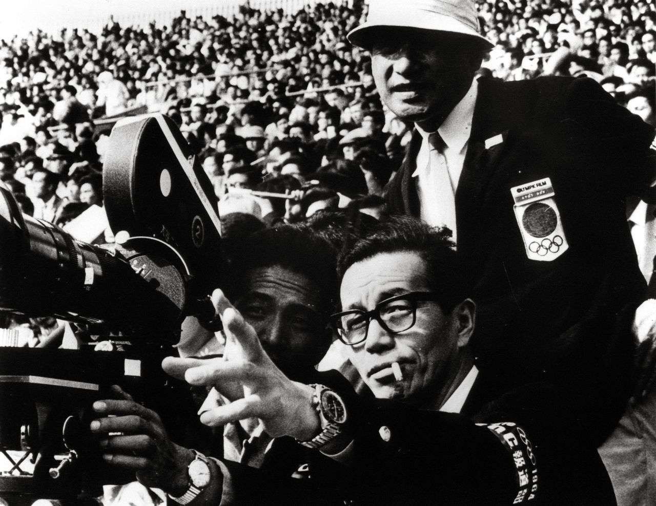 Kon Ichikawa (center) directing a crew at the Tokyo Games of 1964.