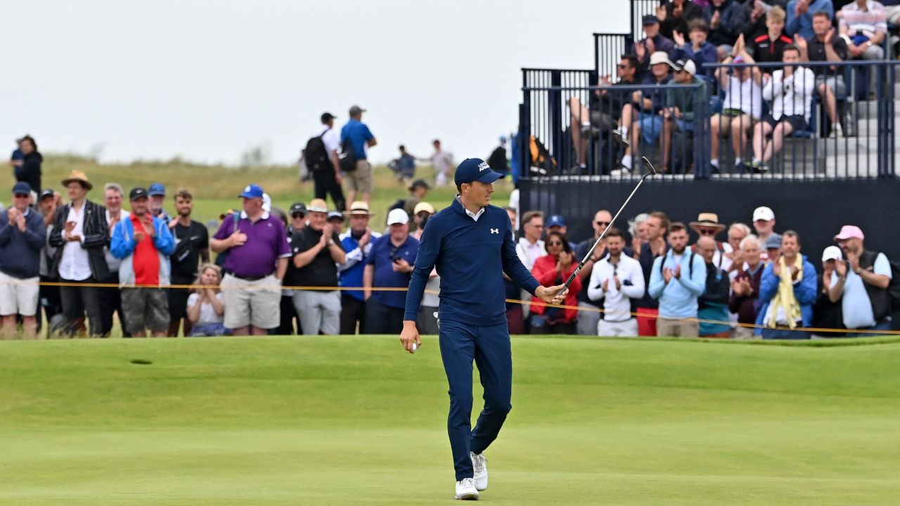 Spieth reacts after making his birdie putt on the 15th green during his first round of The Open.