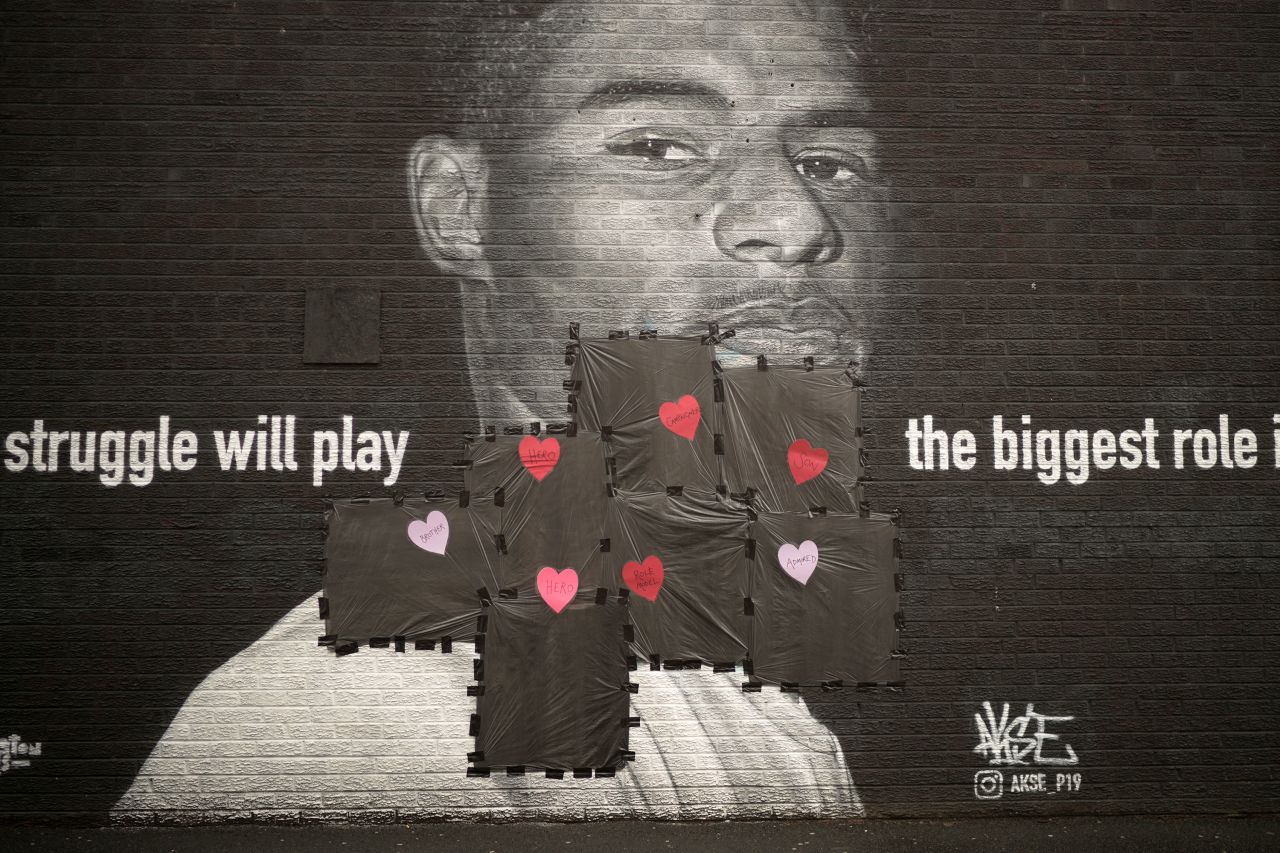Message of love and support are taped over racist graffiti that had defaced a mural of soccer star Marcus Rashford in Manchester, England, on Monday, July 12. Rashford was one of the England players who missed a penalty in the Euro 2020 final against Italy. He and a couple of his Black teammates <a href="https://www.cnn.com/2021/07/12/football/england-racist-abuse-bukayo-saka-jadon-sancho-marcus-rashford-euro-2020-final-spt-intl/index.html" target="_blank">were also targeted with racial abuse on social media.</a>