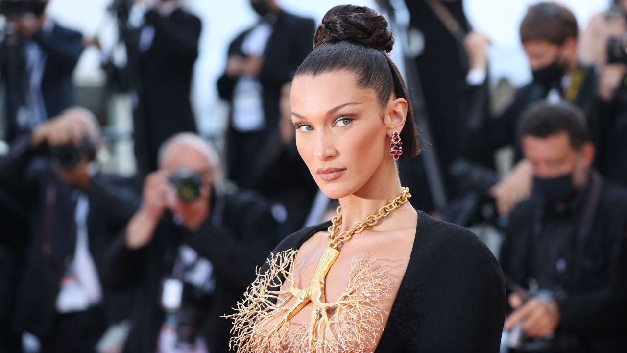 Bella Hadid poses as she arrives for the screening of the film "Tre Piani" (Three Floors) at the 74th edition of the Cannes Film Festival in Cannes, southern France, on July 11, 2021.