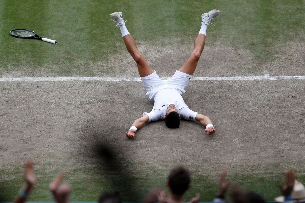 Novak Djokovic falls to the ground in celebration after <a href="https://www.cnn.com/2021/07/11/tennis/novak-djokovic-matteo-berrettini-wimbledon-final-spt-intl/index.html" target="_blank">he defeated Matteo Berrettini in the Wimbledon final</a> on Sunday, July 11. It is the Serbian's 20th grand slam title, tying him with Roger Federer and Rafael Nadal for the most grand slam singles titles ever by a man.