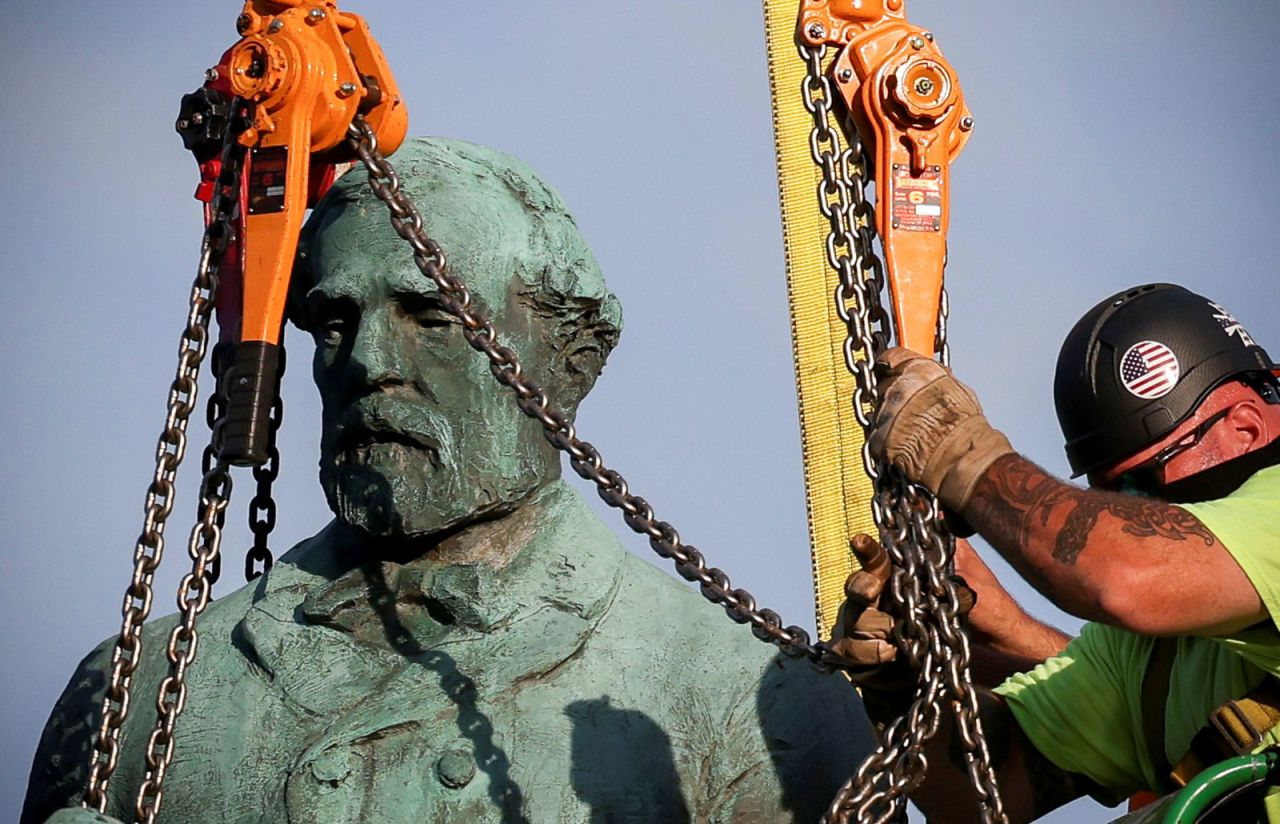 Workers remove a statue of Confederate Gen. Robert E. Lee from a park in Charlottesville, Virginia, on Saturday, July 10. A statue of another Confederate general, Thomas J. "Stonewall" Jackson, <a href="https://www.cnn.com/2021/07/10/us/charlottesville-statues-coming-down/index.html" target="_blank">was also removed from a Charlottesville park that day.</a> The city said it is looking for a new home for the statues at a museum, military battlefield or historical society.