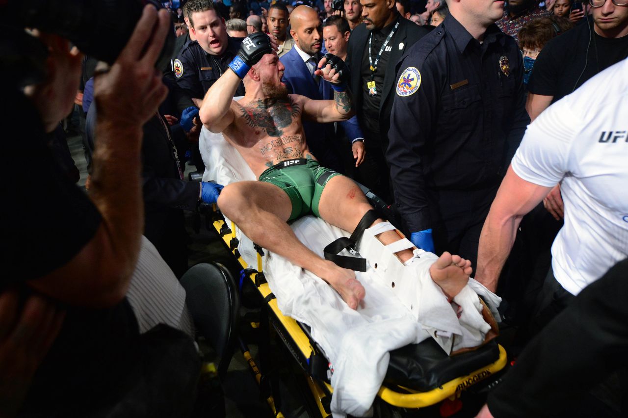 UFC's Conor McGregor is carried off on a stretcher after he <a href="https://www.cnn.com/2021/07/12/sport/conor-mcgregor-surgery-broken-leg-spt-intl/index.html" target="_blank">broke his leg</a> in a bout against Dustin Poirier on Saturday, July 10.