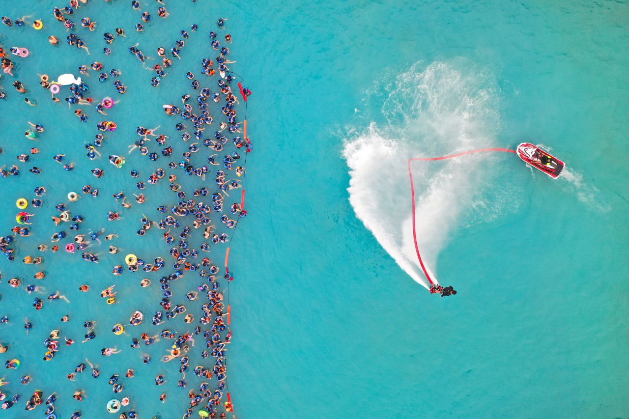 People enjoy a water park in Lianyungang, China, on Sunday, July 11. <a href="http://www.cnn.com/2021/07/08/world/gallery/photos-this-week-july-2-july-8/index.html" target="_blank">See last week in 36 photos</a>