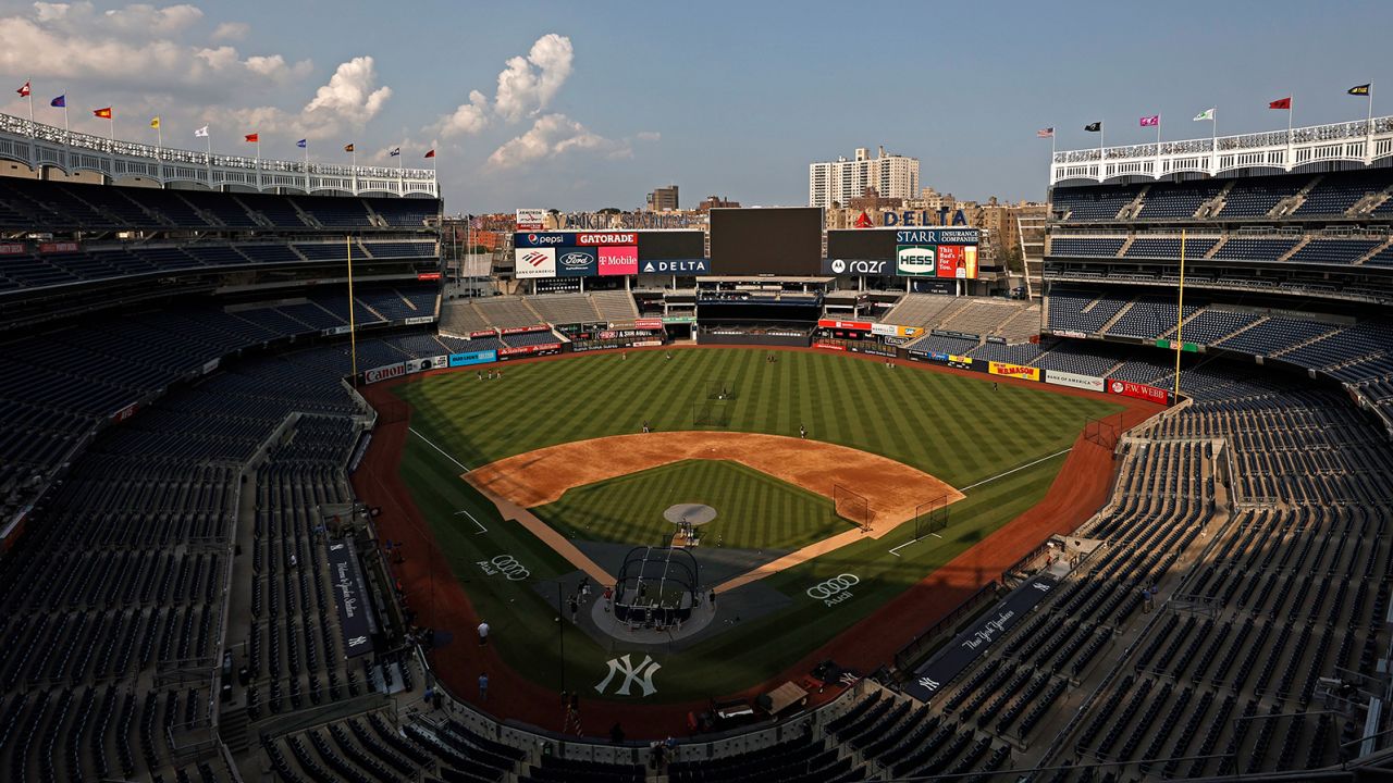 Members of the Boston Red Sox take batting practice at Yankee Stadium on July 15. The game was postponed due to positive Covid-19 tests within the Yankee organization.