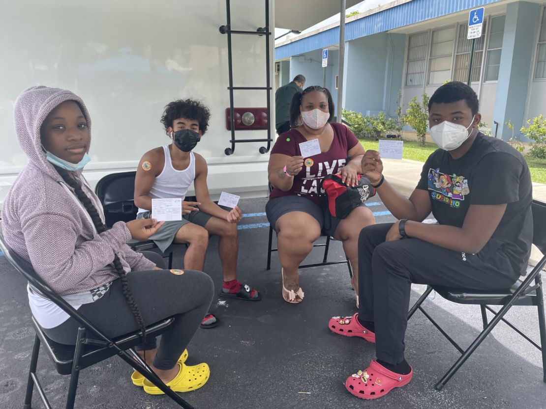 Danielle Chin (second from right) brought three of her children (from left), Dhazima, Marqes and Trayveon, to receive their Covid-19 vaccinations at a mobile clinic in Miami on Wednesday, July 14.