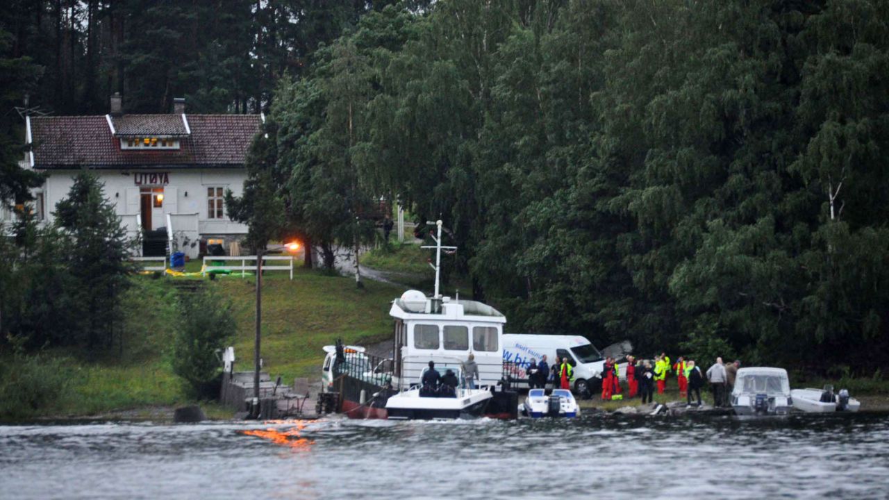 Police and emergency services gather following the massacre at a summer youth camp on July 22, 2011 on Utoya Island, Norway.