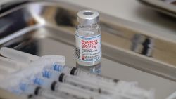 A vial of the Moderna Covid-19 vaccine and syringes sit prepared at a pop up vaccine clinic at the Jewish Community Center on April 16, 2021 in the Staten Island borough of New York City. 