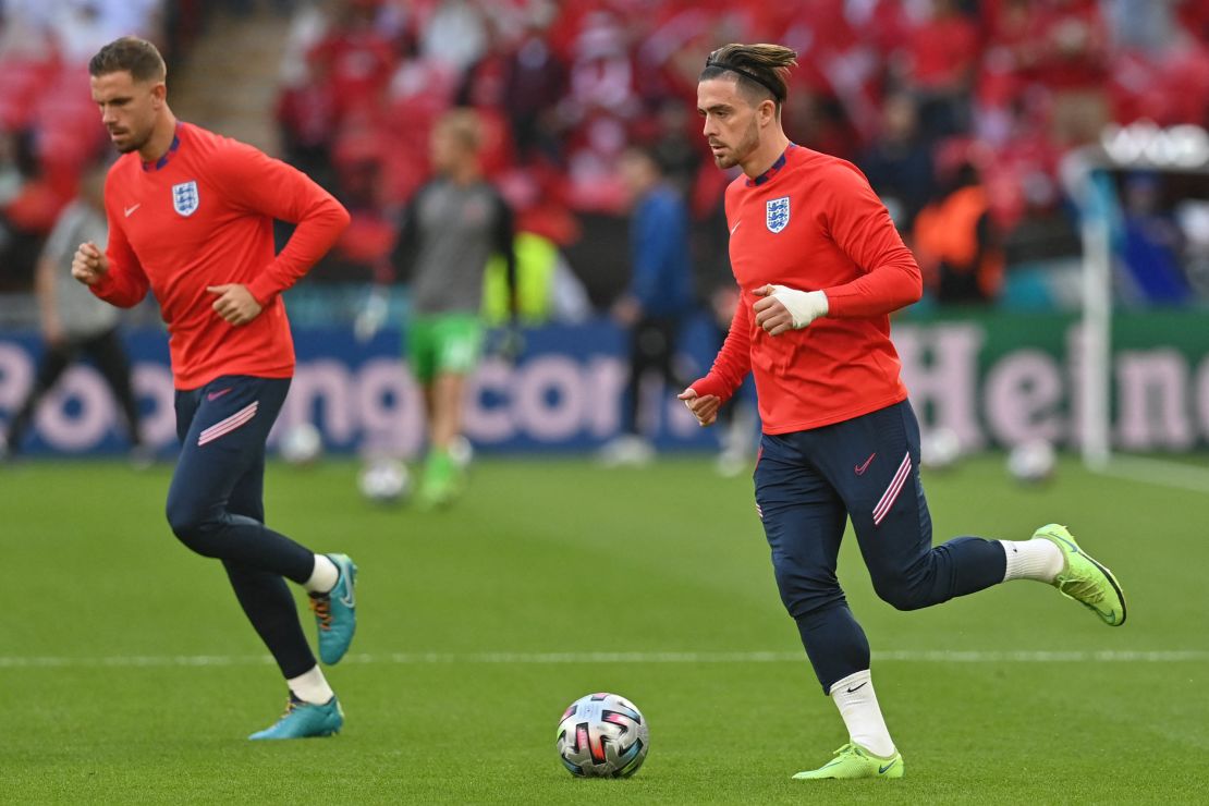 England midfielders Jordan Henderson (left) and Jack Grealish (right) were two members of the squad who insisted it was important for the team to take the knee.