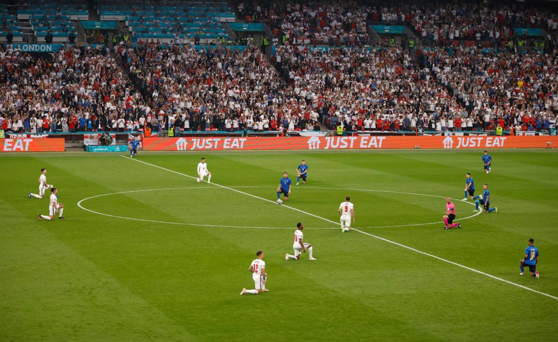 England and Italy players take the knee prior to the UEFA Euro 2020 Championship Final at Wembley Stadium on July 11, 2021.