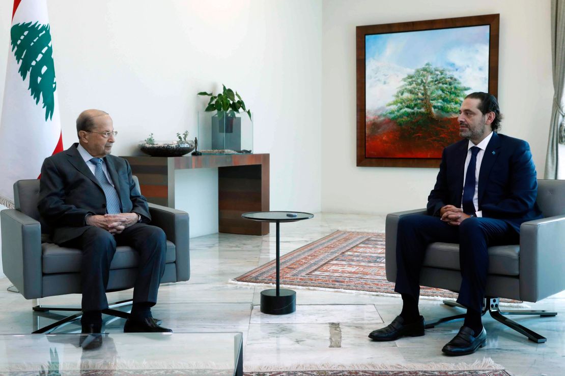 Michel Aoun, left, meets with Saad Hariri at the presidential palace, in Baabda.