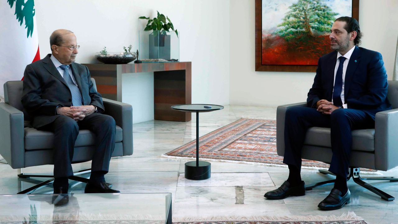 Michel Aoun, left, meets with Saad Hariri at the presidential palace, in Baabda.