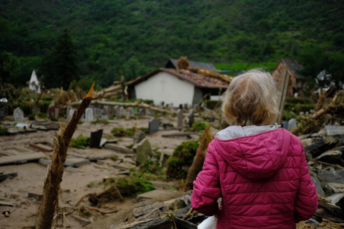 Antoinnette Steinhoff stands at the edge of the flooded graveyard in Altenahr.