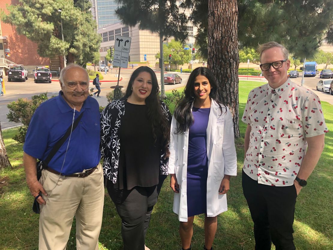 Marcelo Olavarria, left, and Jeff Sweat, right, stand with the therapists helping them learn to breathe again: opera singer Nani Sinha and pulmonologist Dr. Nida Qadir.