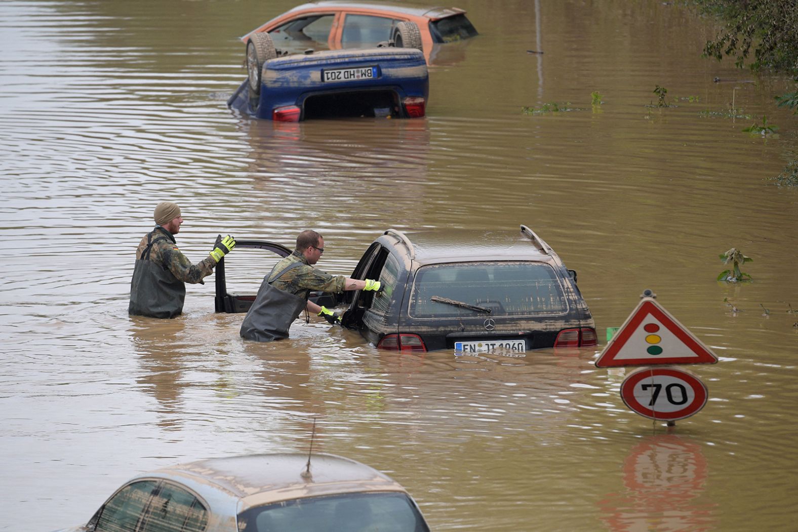 Members of the German armed forces search for flood victims in Erftstadt, Germany, on Saturday.