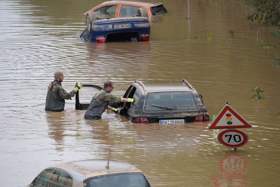 Members of the German armed forces search for flood victims in Erftstadt, Germany, on Saturday.