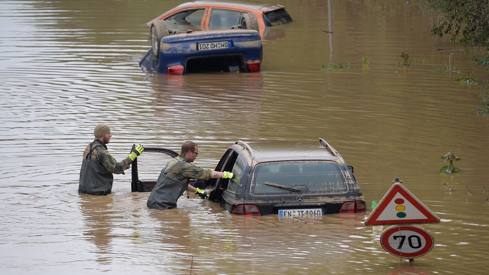 Members of the German armed forces search for flood victims in Erftstadt, Germany, on Saturday.