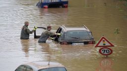 TOPSHOT - Soldiers of the German armed forces Bundeswehr search for flood victims in submerged vehicles on the federal highway B265 in Erftstadt, western Germany, on July 17, 2021, after heavy rains hit parts of the country, causing widespread flooding and major damage. - Rescue workers scrambled on July 17 to find survivors and victims of the devastation wreaked by the worst floods to hit western Europe in living memory, which have already left more than 150 people dead and dozens more missing. (Photo by SEBASTIEN BOZON / AFP) (Photo by SEBASTIEN BOZON/AFP via Getty Images)