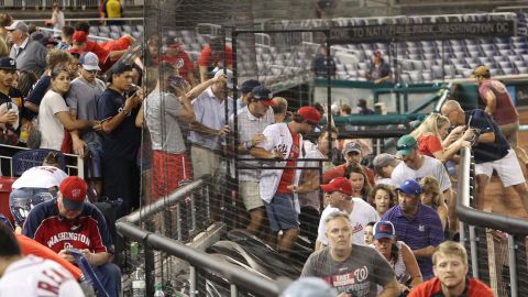 Fans leave their seats after a shooting outside Nationals Park during an MLB game in Washington, DC, on Saturday.