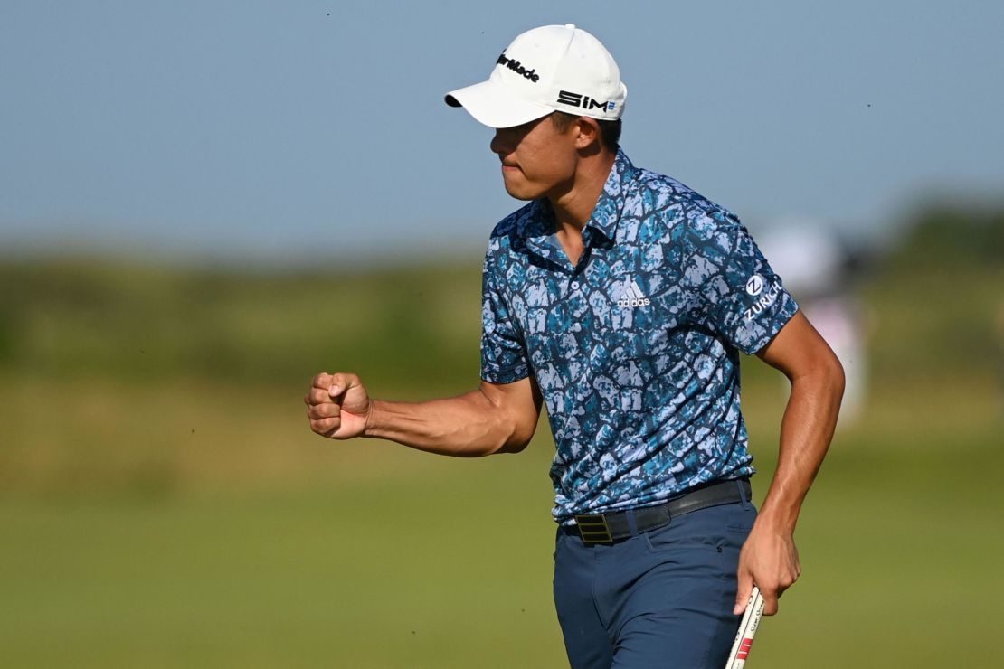 Morikawa celebrates after a putt on the 14th green during his final round of the Open.