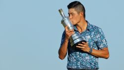 SANDWICH, ENGLAND - JULY 18: Open Champion, Collin Morikawa of United States kisses the Claret Jug on the 18th hole during Day Four of The 149th Open at Royal St George's Golf Club on July 18, 2021 in Sandwich, England. (Photo by Andrew Redington/Getty Images)