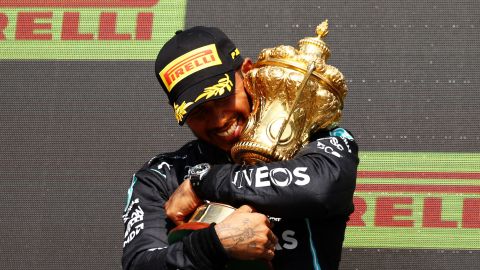 Lewis Hamilton celebrates on the podium at Silverstone.