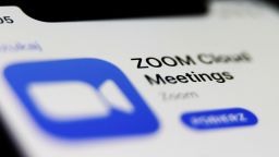 Zoom app logo is seen displayed on phone screen in this illustration photo taken in Poland on July 23, 2020. Video meeting apps gained popularity during the coronavirus pandemic. (Photo illustration by Jakub Porzycki/NurPhoto via AP)