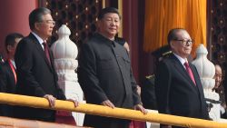 Chinese President Xi Jinping (C) attends a military parade with former presidents Hu Jintao (L) and Jiang Zemin in Tiananmen Square in Beijing on October 1, 2019, to mark the 70th anniversary of the founding of the PeopleÕs Republic of China. (Photo by GREG BAKER / AFP)        (Photo credit should read GREG BAKER/AFP via Getty Images)