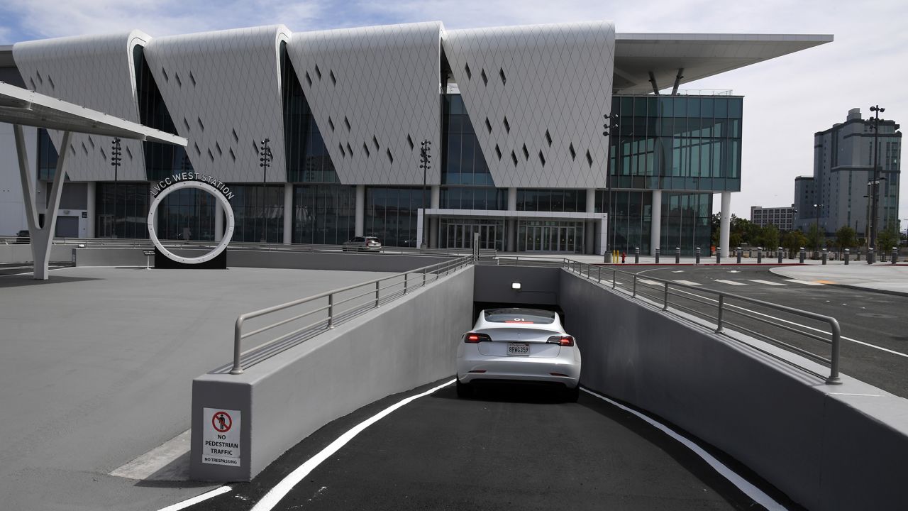 A Tesla car drives through the West Station near the Las Vegas Convention Center West Hall expansion during a media preview of the Las Vegas Convention Center Loop earlier this year.