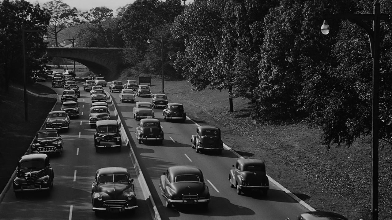 Cars on a section of the Southern State Parkway in Nassau County, New York at exit 28 showing typical weekday traffic circa 1960.