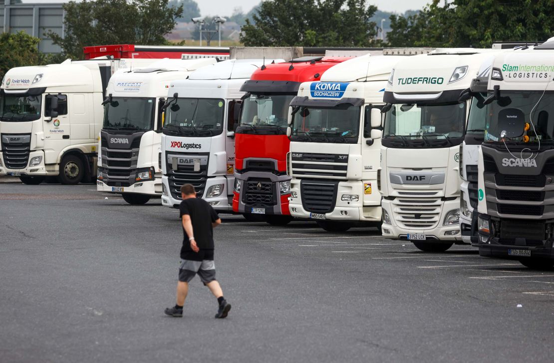 Heavy goods vehicles at a truck stop near Chafford Hundred, UK, on July 13, 2021. Almost a third of UK logistics companies expect to face trucker shortages this year.