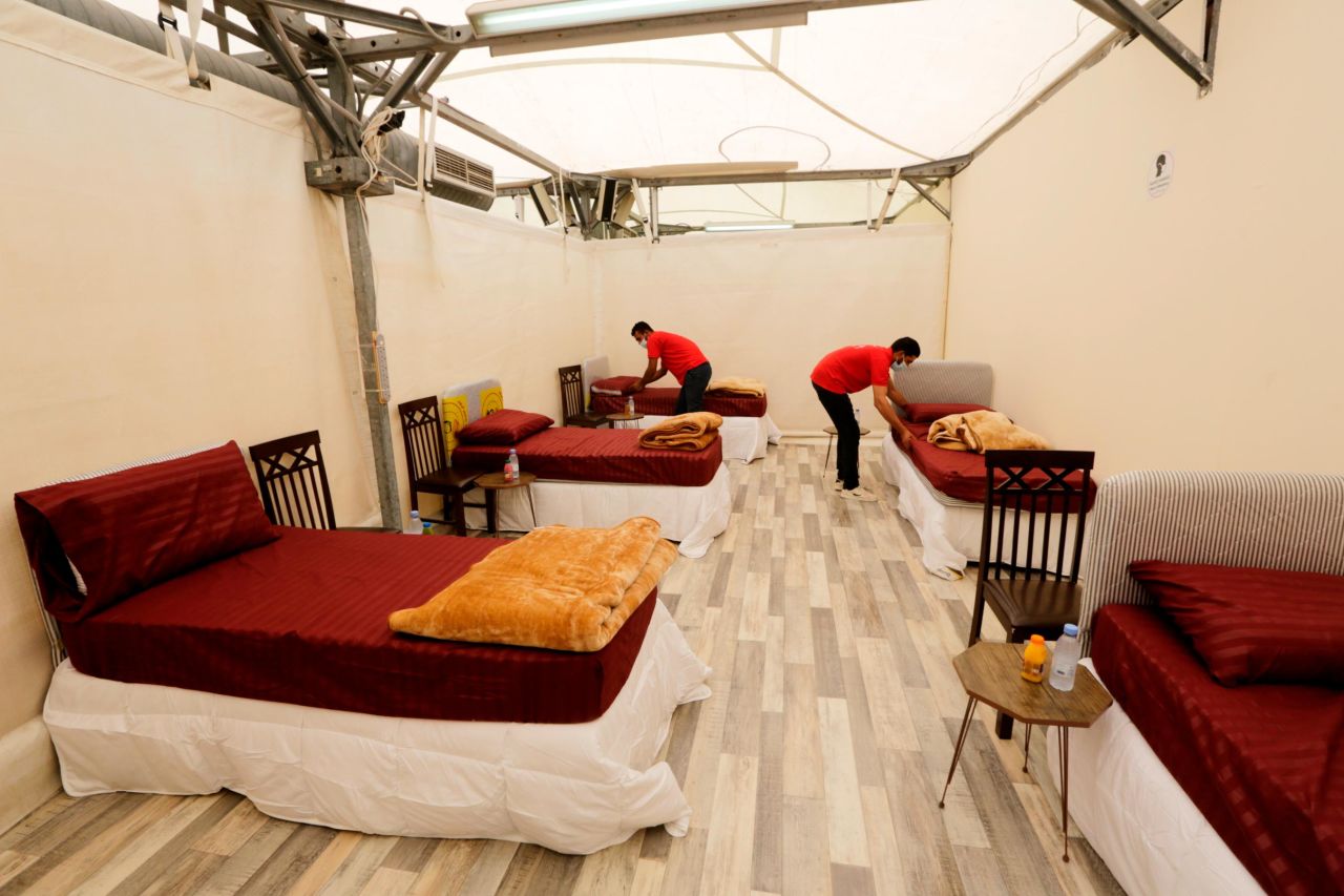 Workers set up accommodations for pilgrims at the Mina tent camp on July 12.