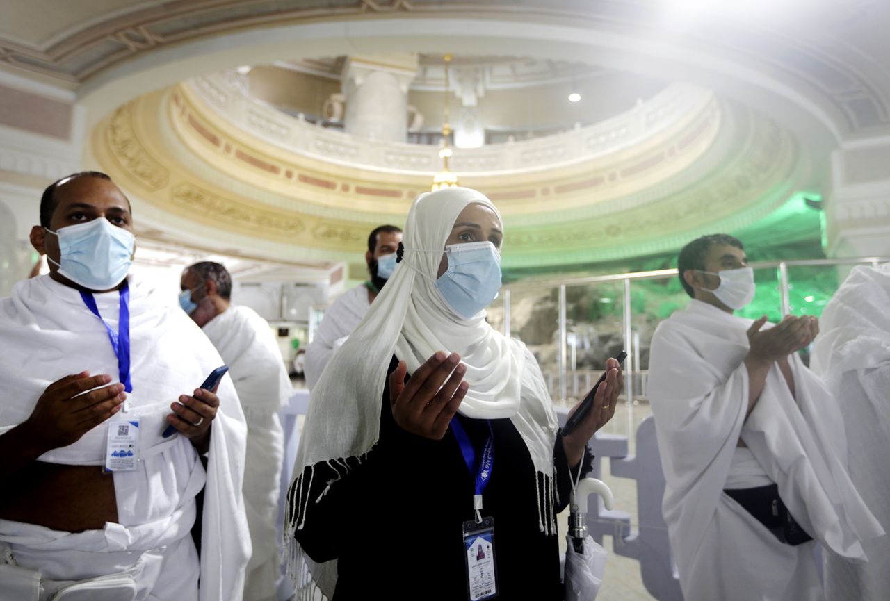 Pilgrims pray in front of the Al-Safa mountain at the Grand Mosque on Sunday.
