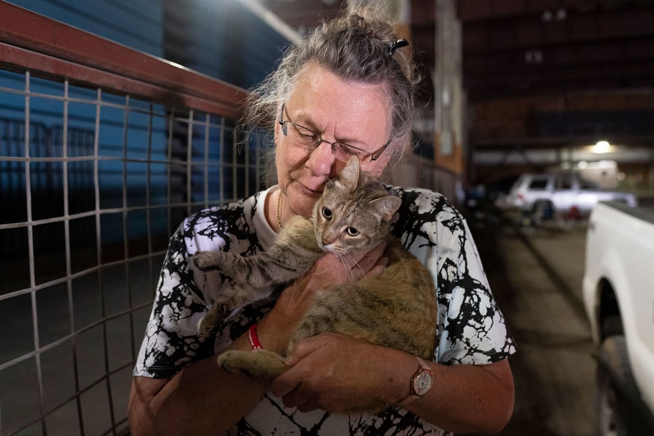 Evacuee Dee McCarley hugs her cat Bunny at a Red Cross center in Klamath Falls, Oregon, on July 14.