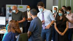 Canada's Prime Minister Justin Trudeau greets people as he visits a vaccination site, amid the coronavirus disease (COVID-19) pandemic, in Montreal, Quebec, Canada July 15, 2021. REUTERS/Christinne Muschi